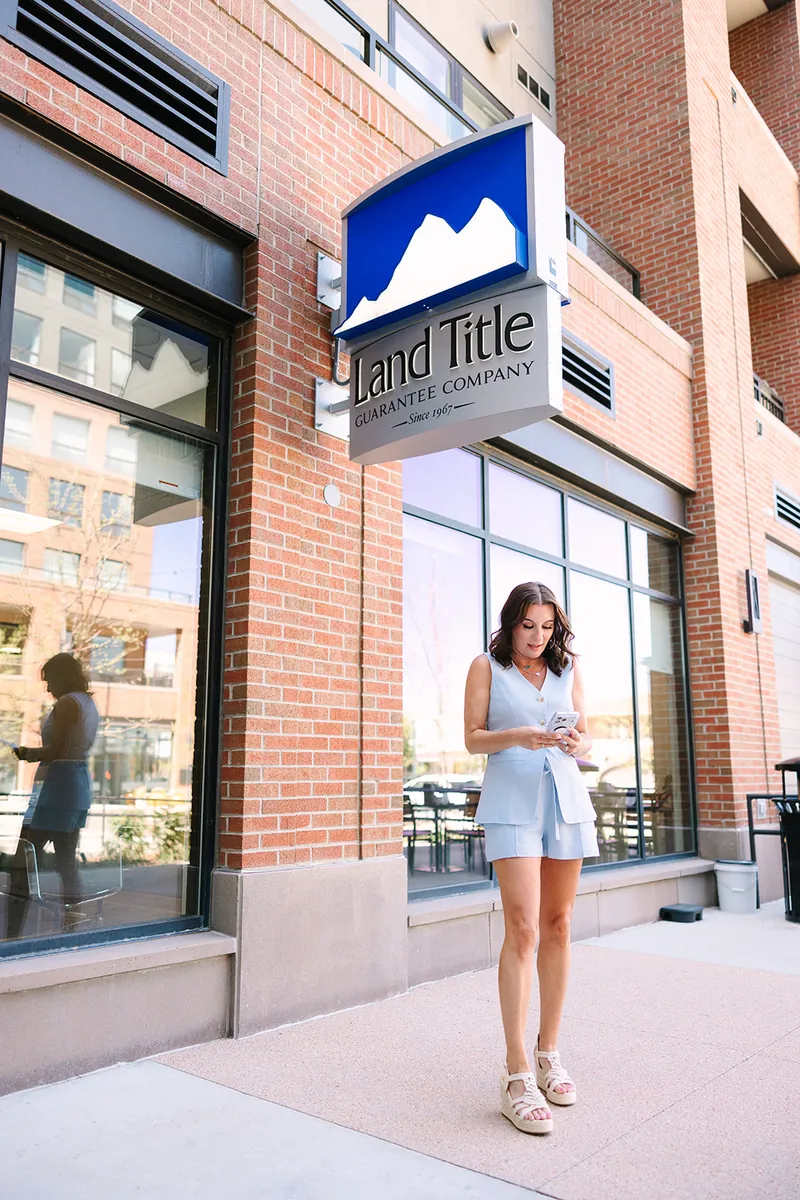 Jessica Lentz outside the Land Title Guarantee Company office